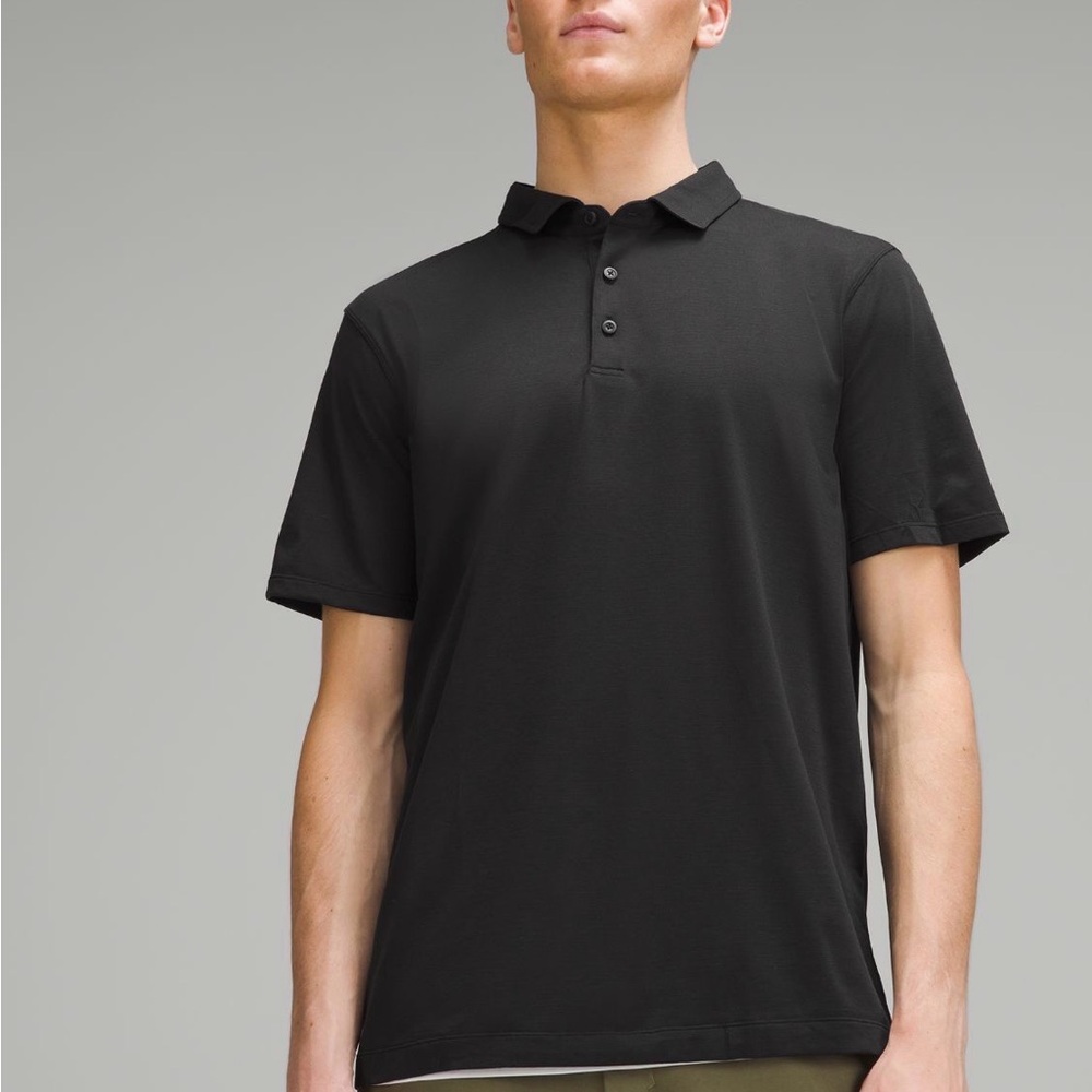 Men's lululemon Evolution Black heather Polo Shirt. Size M. Great condition.